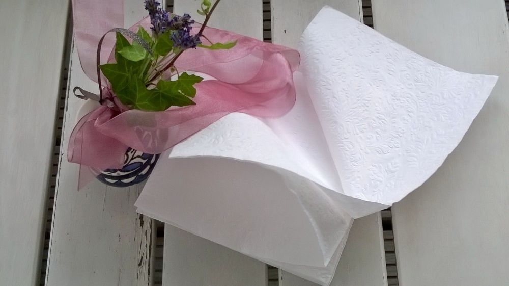 Some wind gently takes the napkins away